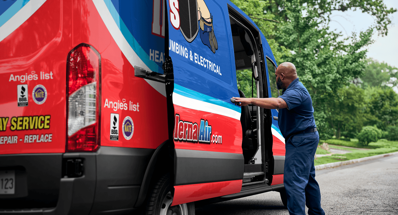 A professional IERNA's technician opening a service van on a residential street, ready to provide home HVAC, plumbing, and electrical services.