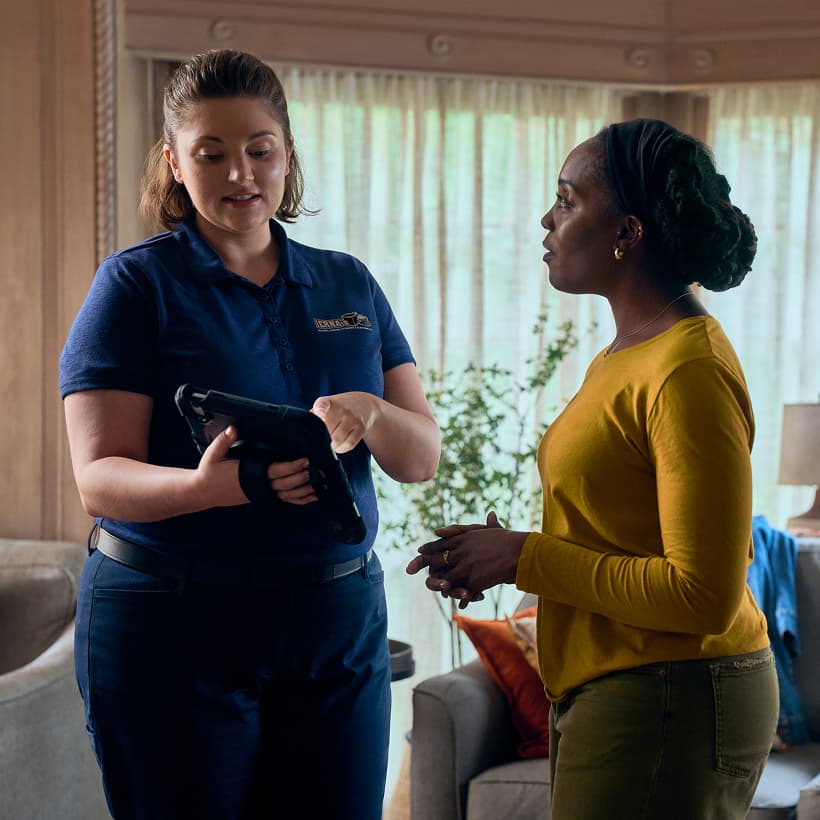 An IERNA'S Comfort Advisor discuss our Comfort360 Membership benefits with a homeowner.