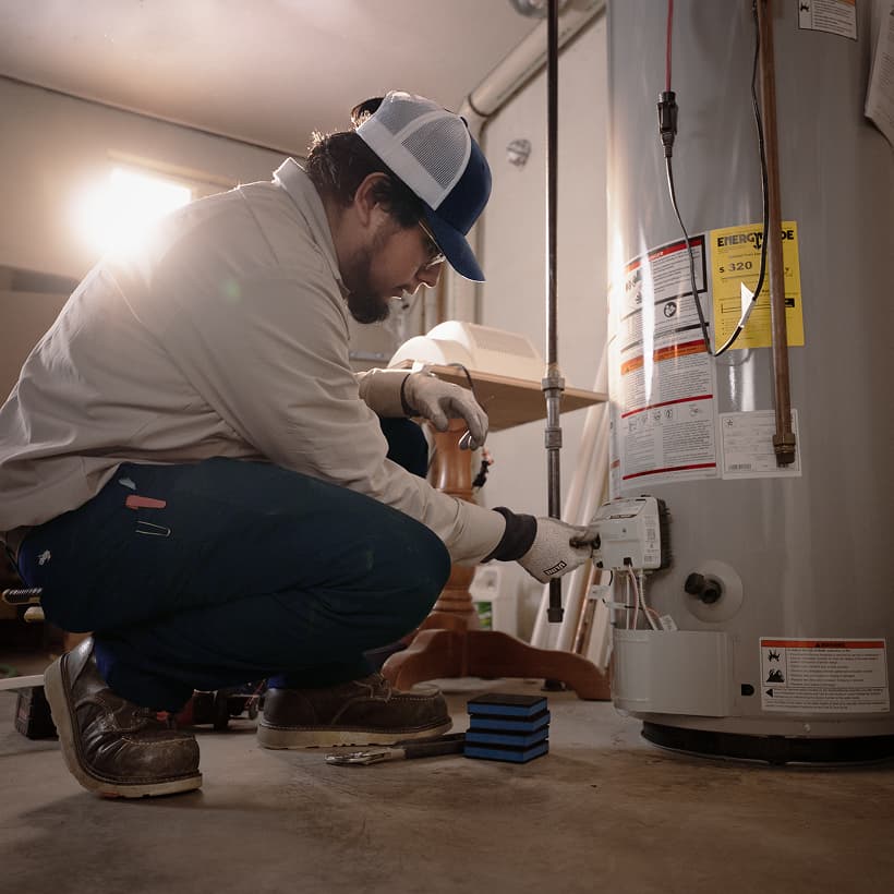 A IERNA'S technician discusses the repair and installation services with a homeowner.